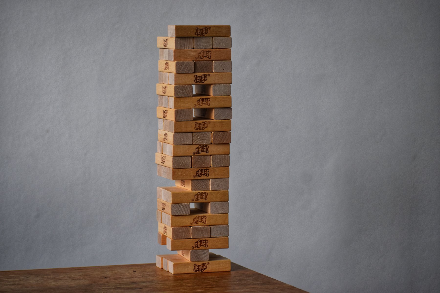 Tower of wooden blocks on table